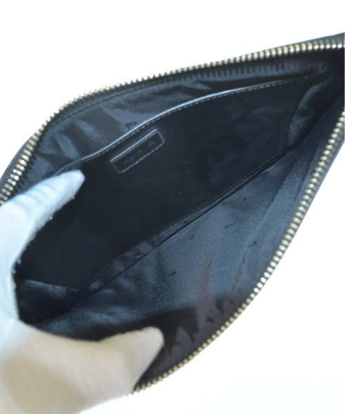 agnes b. VOYAGE Clutches