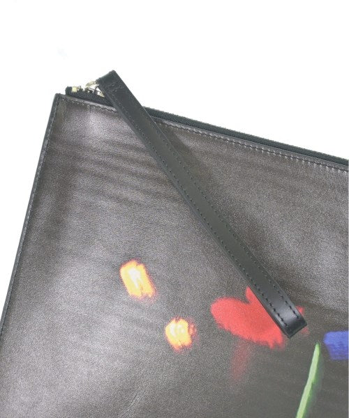 agnes b. VOYAGE Clutches